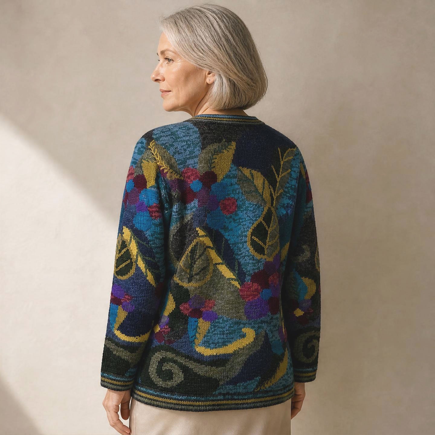 Janet 100% alpaca cardigan with blue green and gold floral pattern