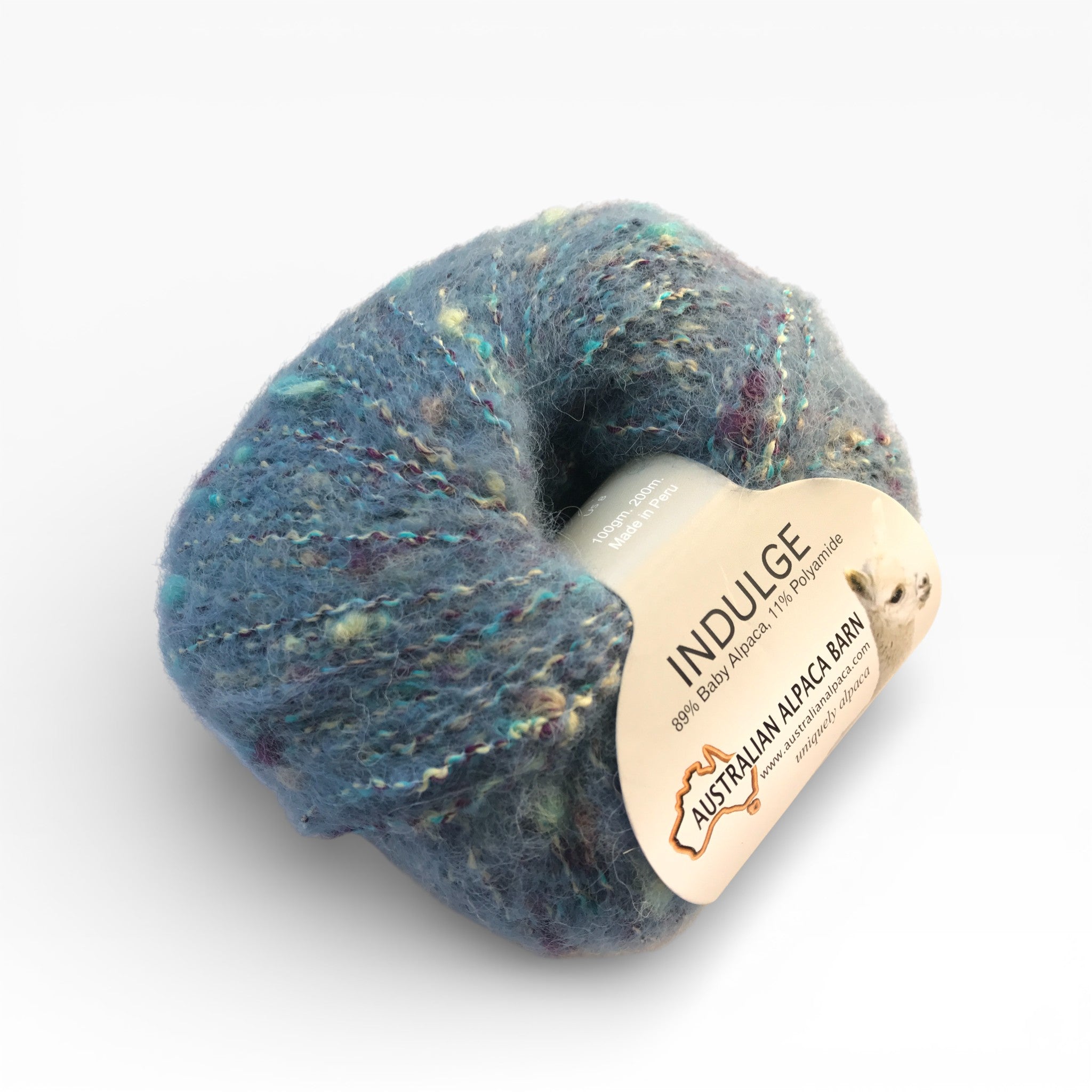 Aqua Alpaca bouclé yarn in the Indulge range