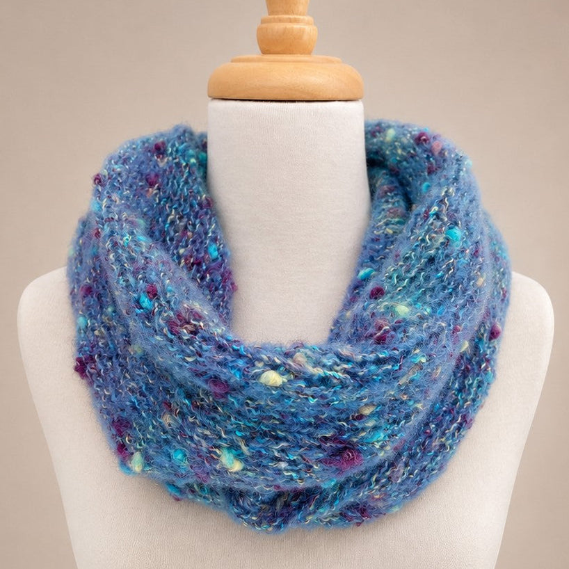 Australian Made Indulge Bouclé Alpaca Cowl in Aqua blue with soft bouclé texture and colourful flecked yarn.