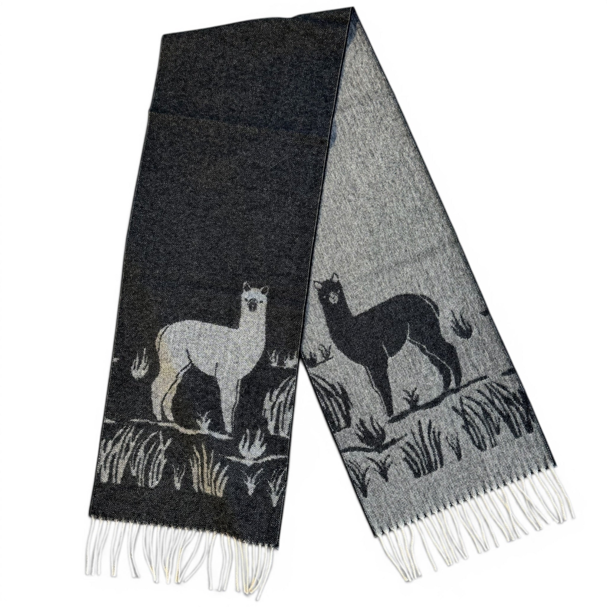 Black and white alpaca scarf with woven jacquard alpaca pattern and fringed edges