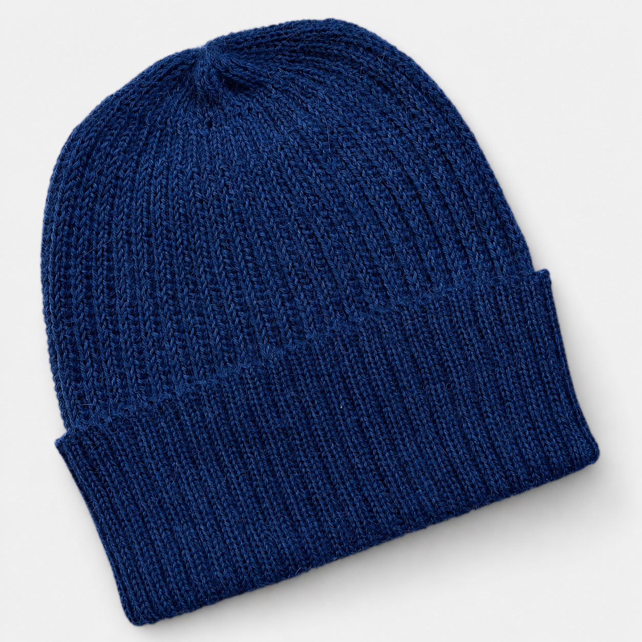 Blue knit luxury alpaca beanie, breathable natural fibre for cold head
