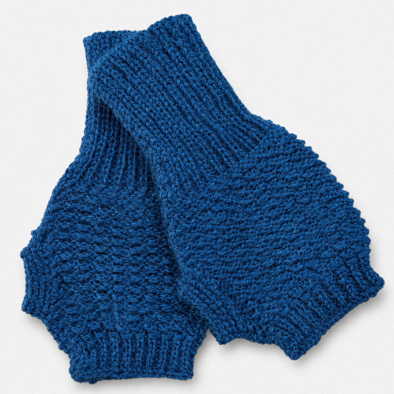 Women’s fingerless alpaca gloves in blue, lightweight breathable winter accessory.