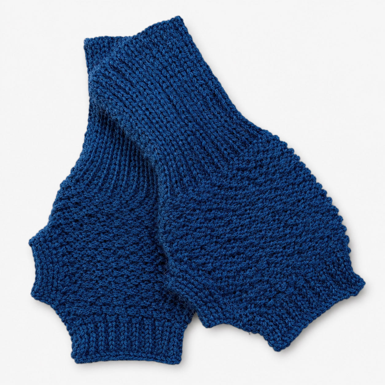 Luxury blue fingerless gloves in soft alpaca yarn, cosy winter accessory.