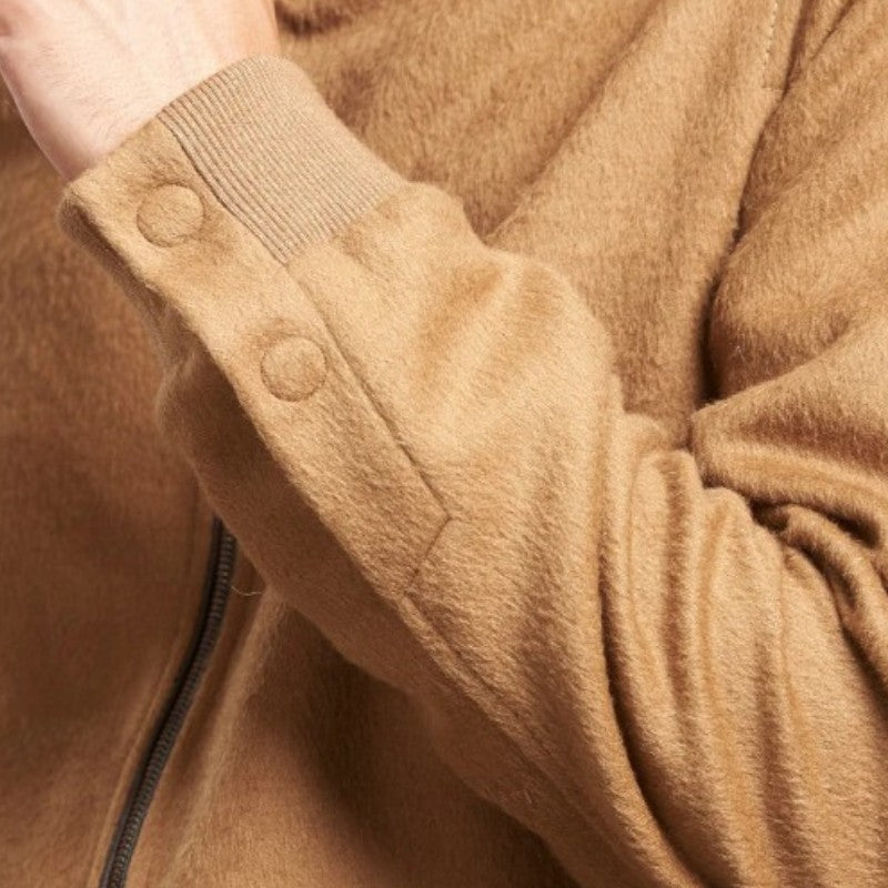 Close-up of the Nadrian jacket showing soft alpaca texture and cuff detail
