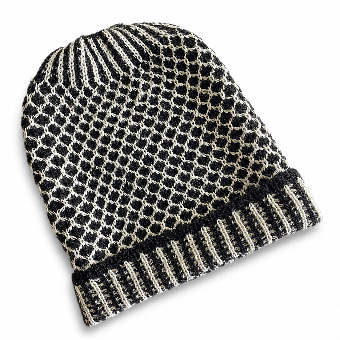 Cosy textured Baby Alpaca beanie designed for cold-weather wear.
