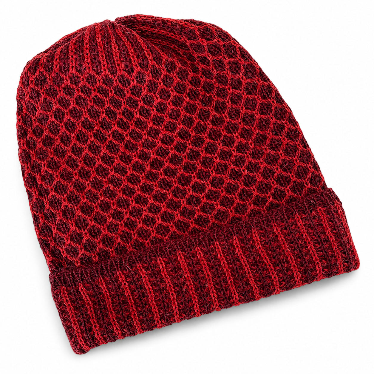 Nogal Baby Alpaca beanie with textured beehive knit and ribbed turned-up cuff.