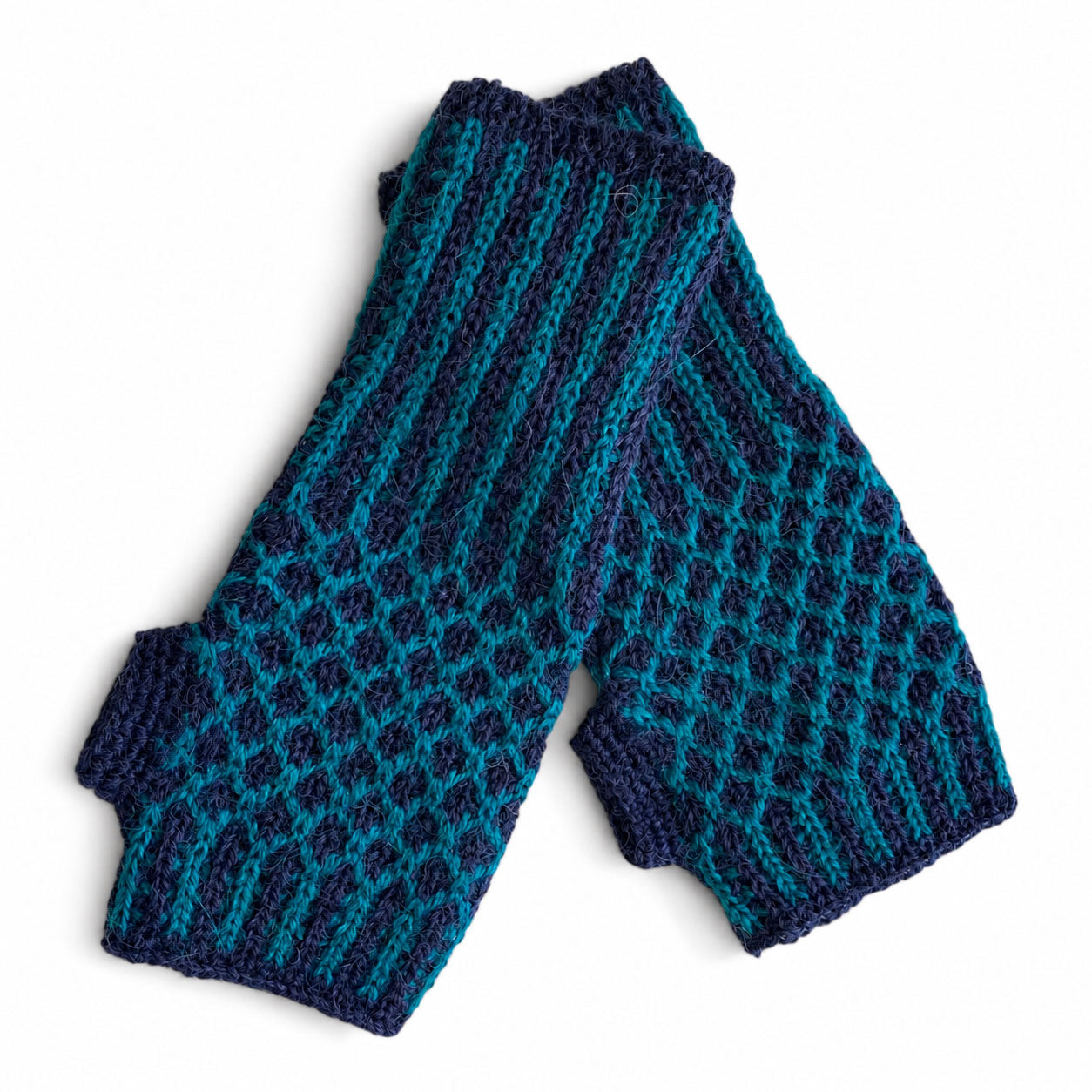 Nogal Baby Alpaca fingerless gloves in Aqua and Navy with textured beehive knit and ribbed cuffs.
