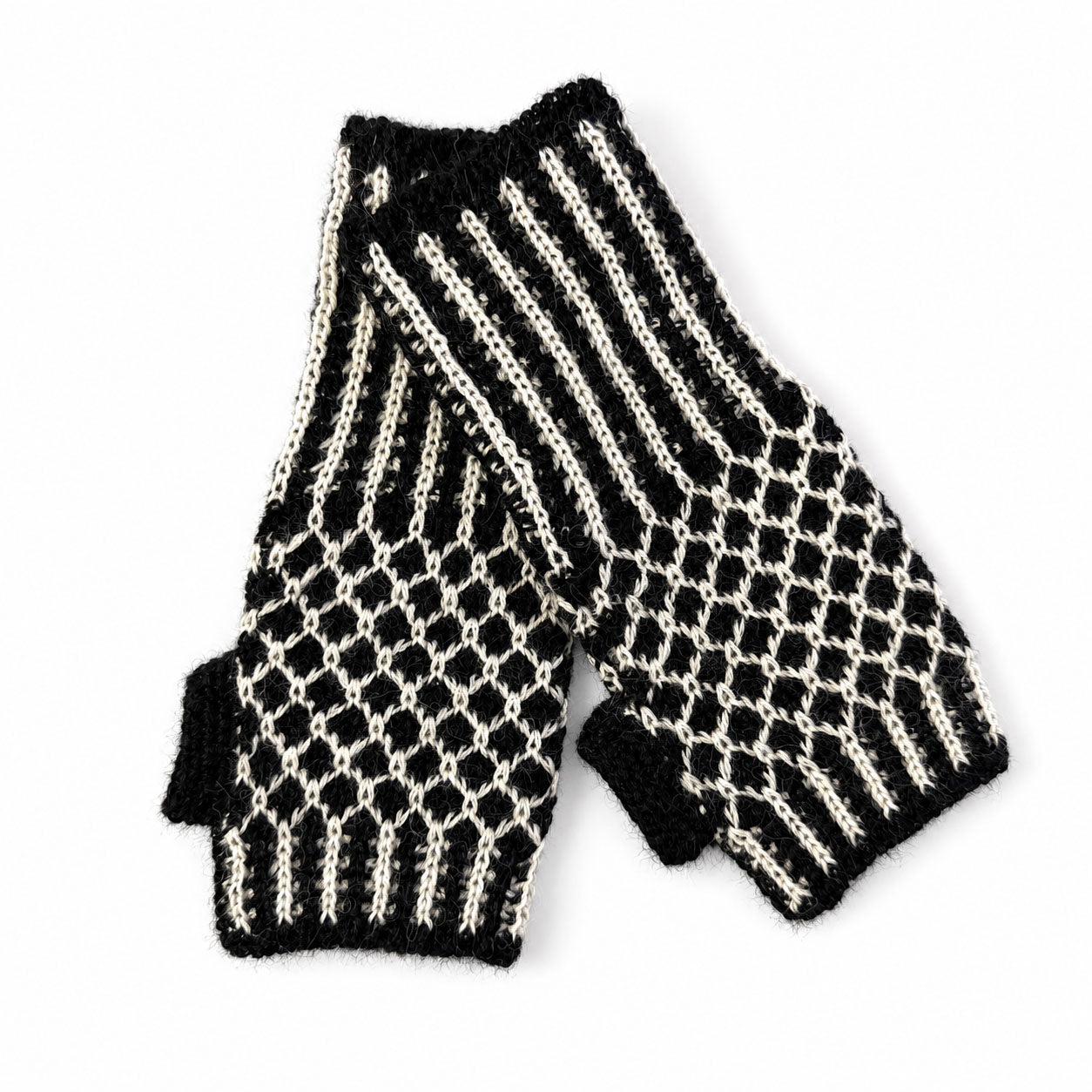 Warm knitted alpaca wrist warmers for typing, driving and everyday winter wear.