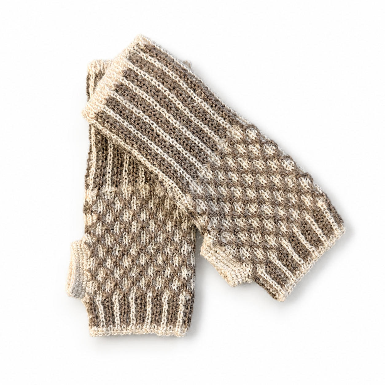 Soft Baby Alpaca wrist warmers with ribbed cuffs and contrasting knit pattern.