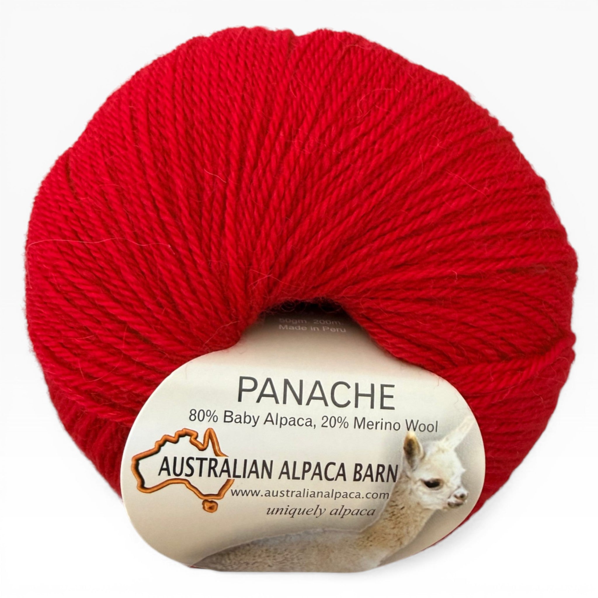 Australian Alpaca Barn 4ply yarn ball in Panache shade red.