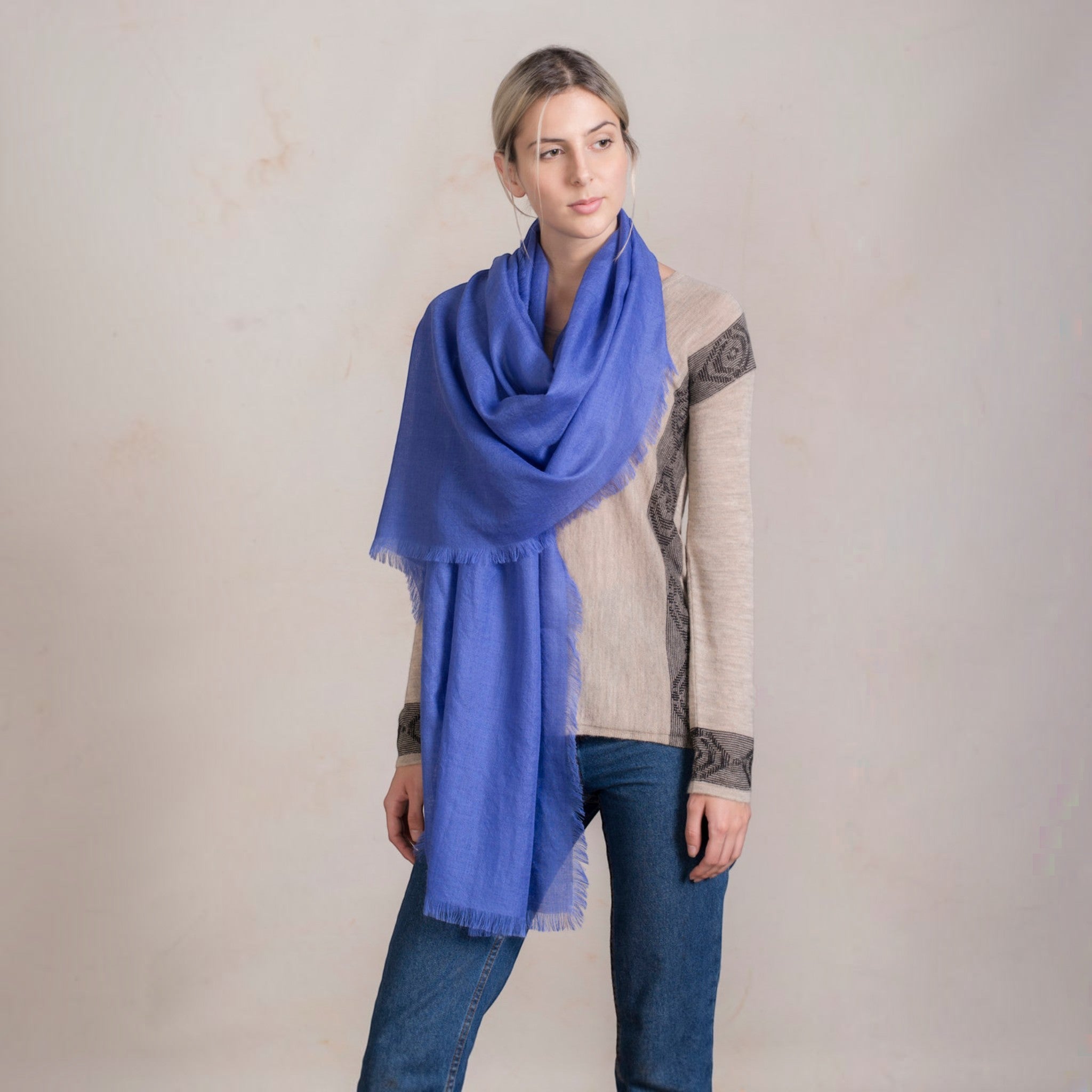 Model wearing Blue alpaca silk shawl, lightweight warm natural fibre accessory.