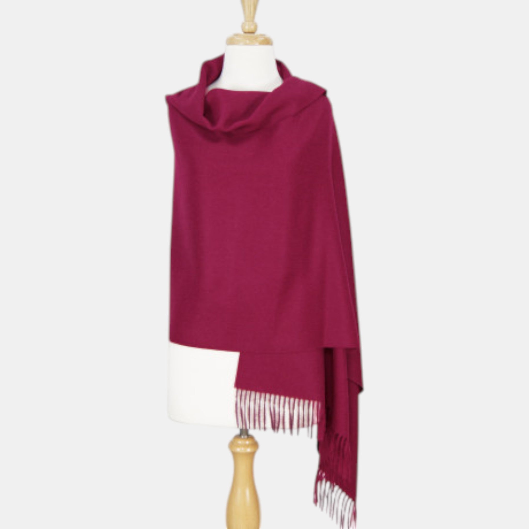 Fine Suri alpaca fibre shawl with soft silky texture and gentle drape in magenta colour.