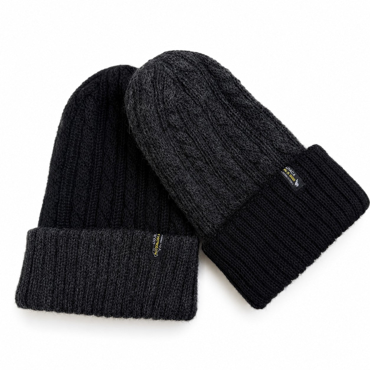 Cosy reversible alpaca beanie for men and women in black and charcoal.