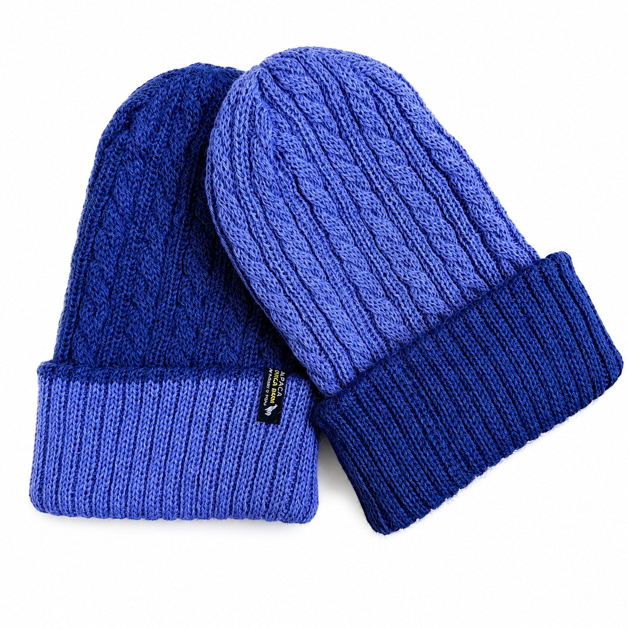 Warm baby alpaca beanie with reversible design in blues