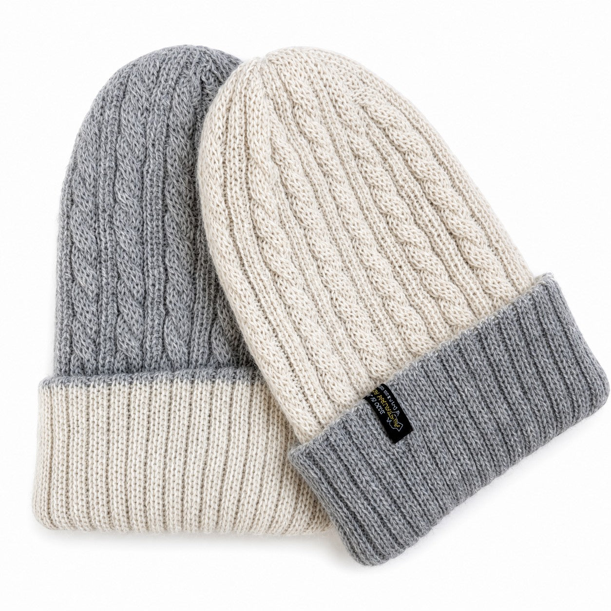 Soft reversible baby alpaca beanie for winter warmth in cream and silver