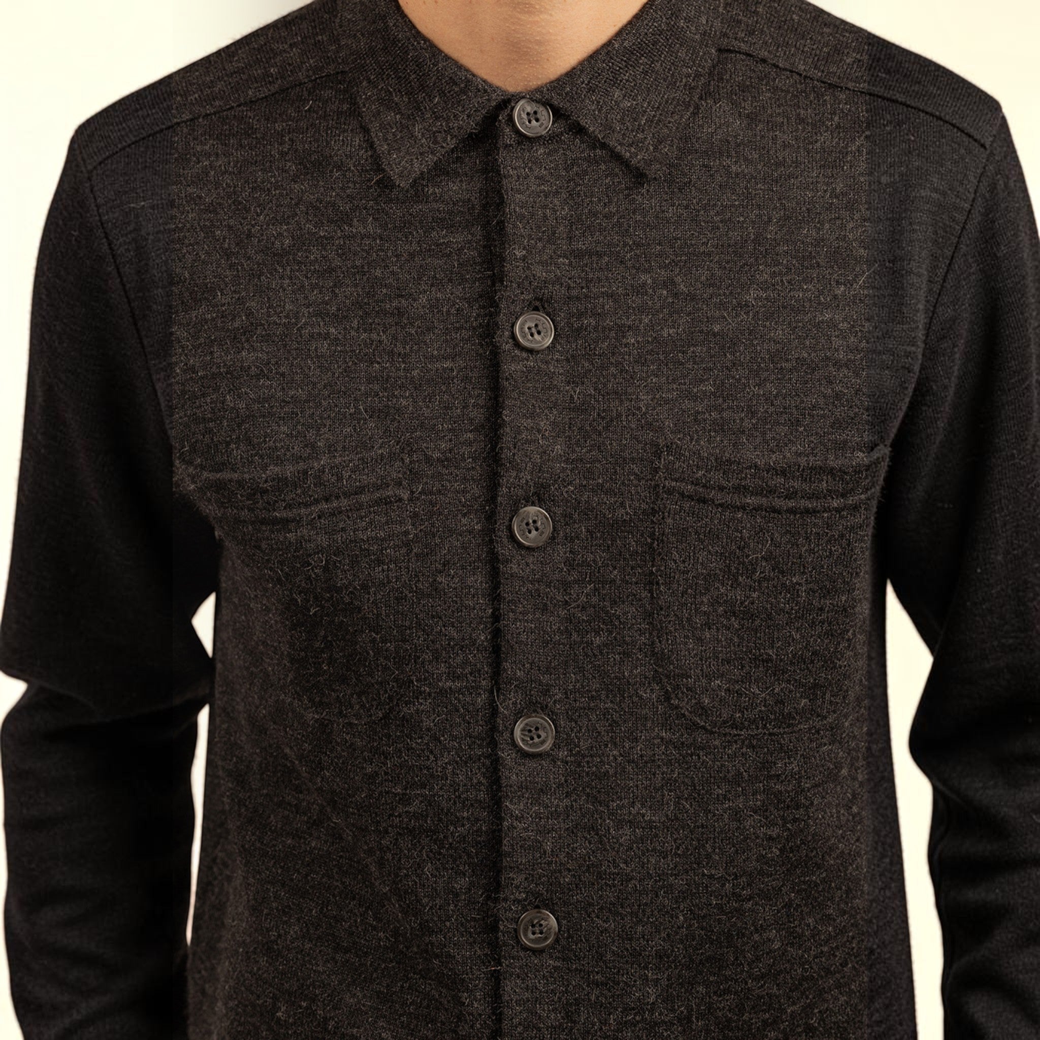 Male model wearing soft Kuna alpaca cardigan