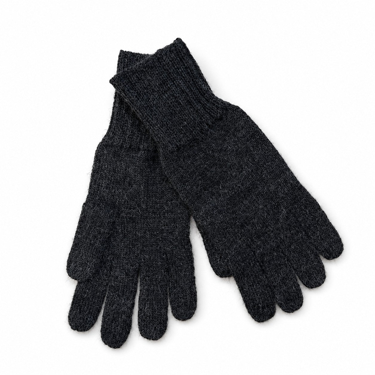 Pair of dark alpaca gray gloves on a white background