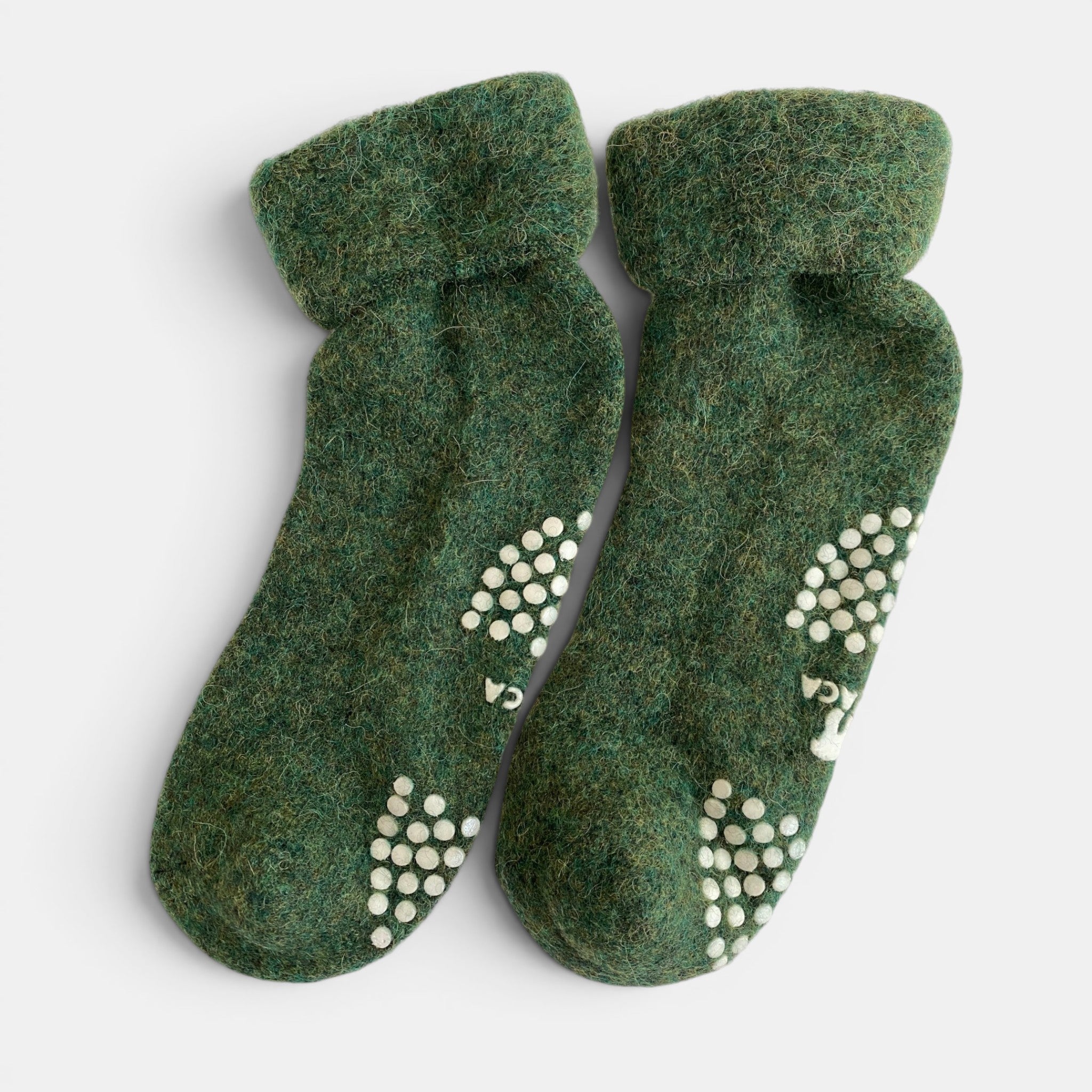 Alpaca bed socks in green with non-slip bottoms, cosy winter socks for cold feet.