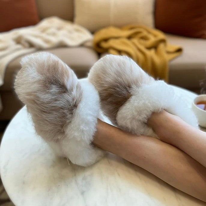 Reversible alpaca slippers styled fur-side-out for a fluffy finish