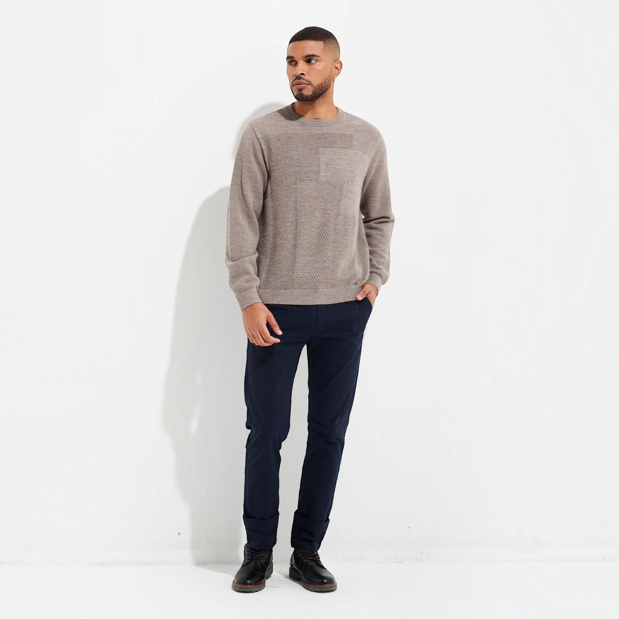 Male model in classic Kuna alpaca knit sweater