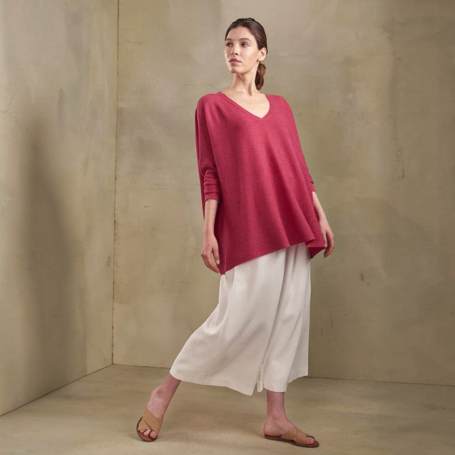 Model wearing Kuna Talisman alpaca silk sweater with V neckline