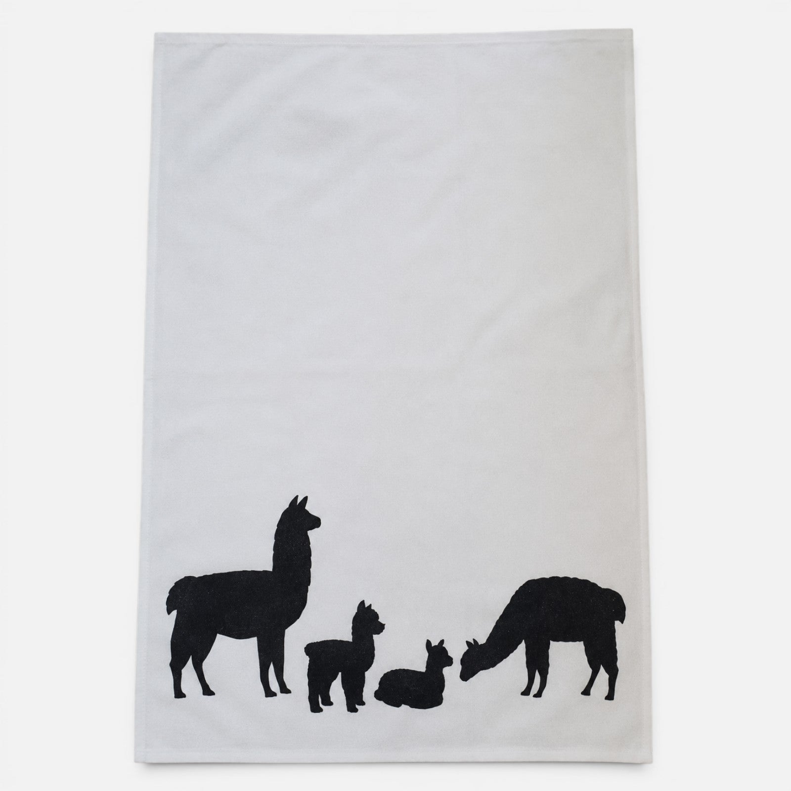 White cotton tea towel featuring a detailed alpaca print
