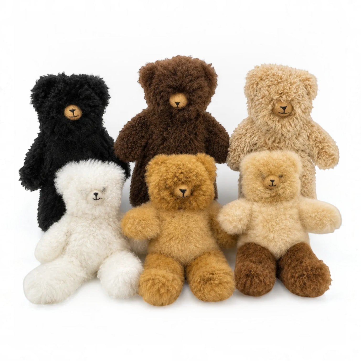 Six Baby Alpaca teddy bears in different fur colours, including black, brown, beige, and white, showing gift idea.