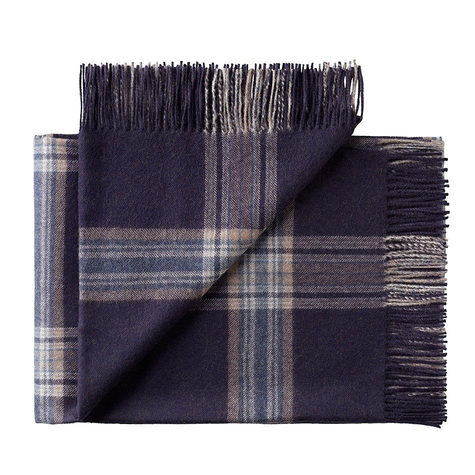 Folded soft alpaca throw rug for warm winter styling in Blue check