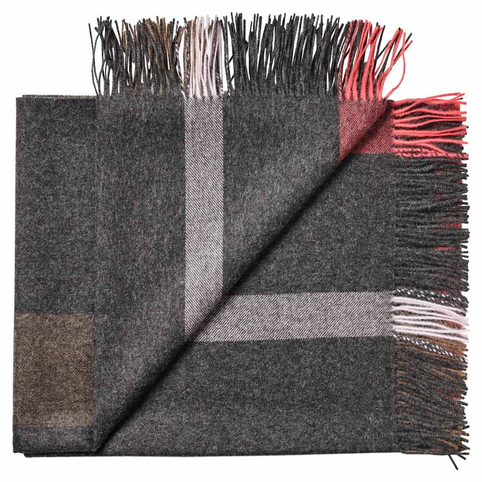 Plaid baby alpaca blanket with checkered pattern in gray, red, and brown for warm winter home decor