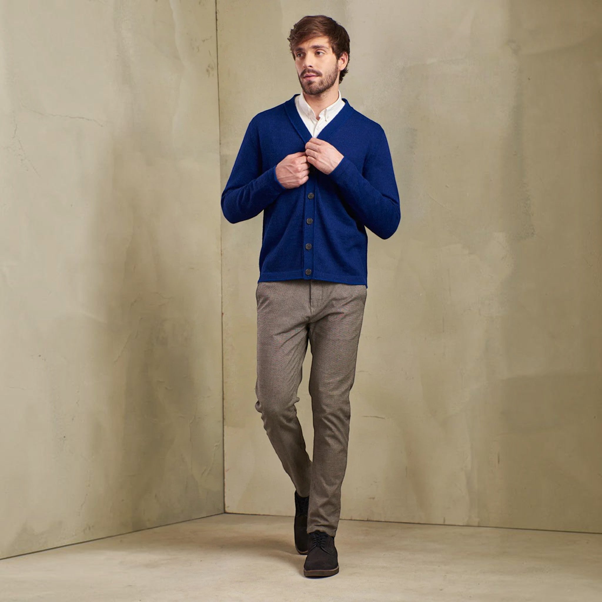 Male model in soft alpaca cardigan with button front
