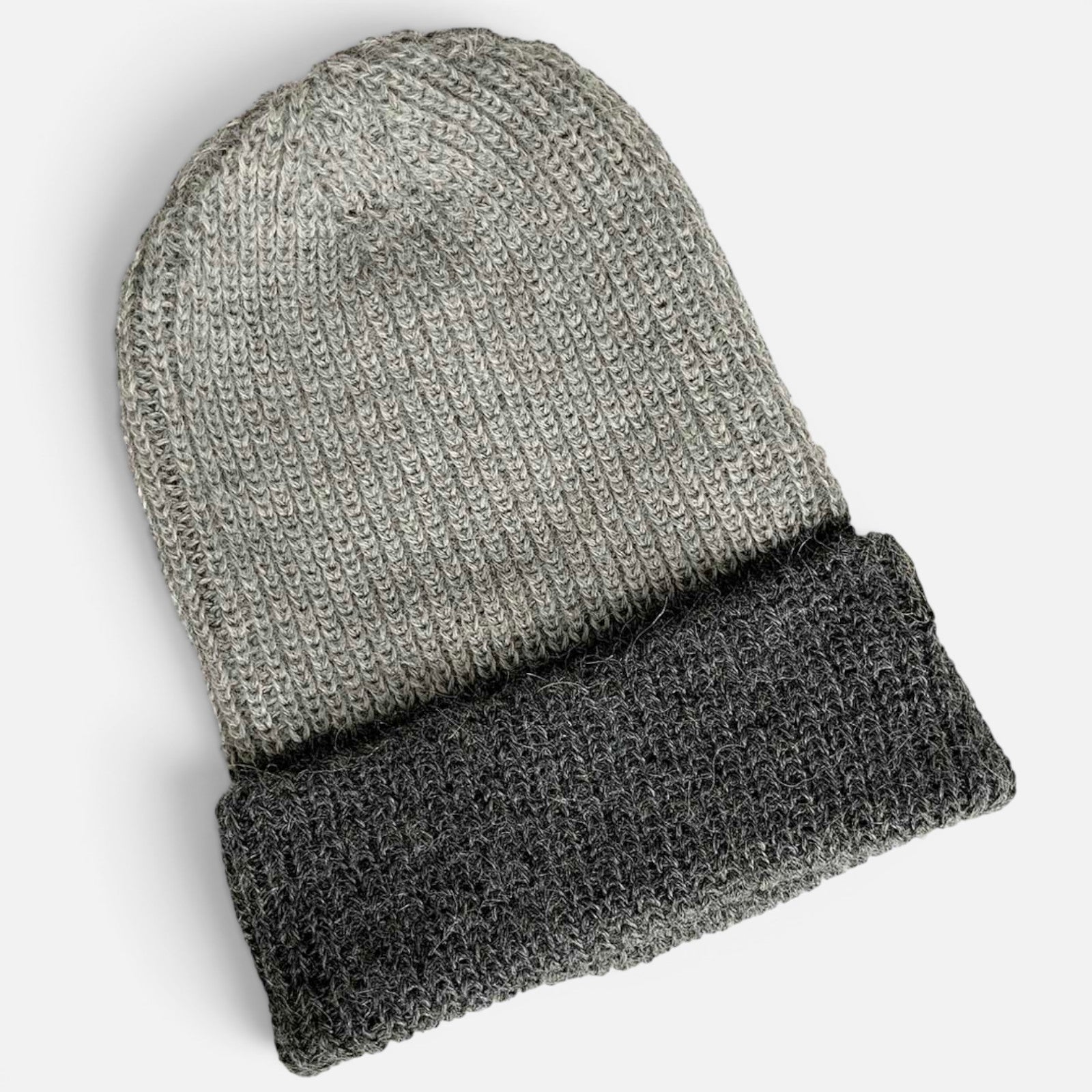 Two-tone ribbed alpaca beanie with a light grey crown and contrasting charcoal turned-up brim