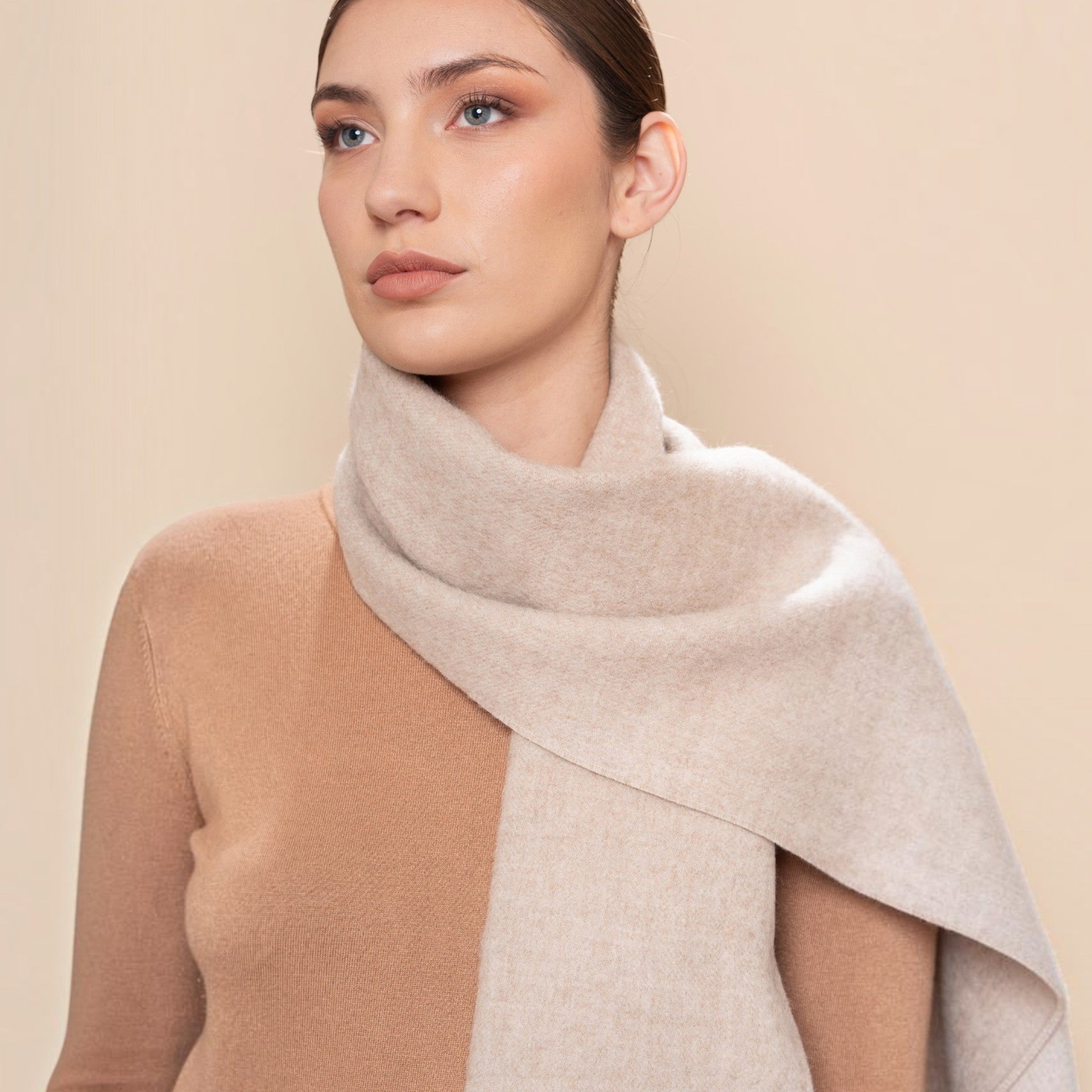 Natural oatmeal 100% Baby Alpaca Eco scarf with soft neutral tone and refined drape
