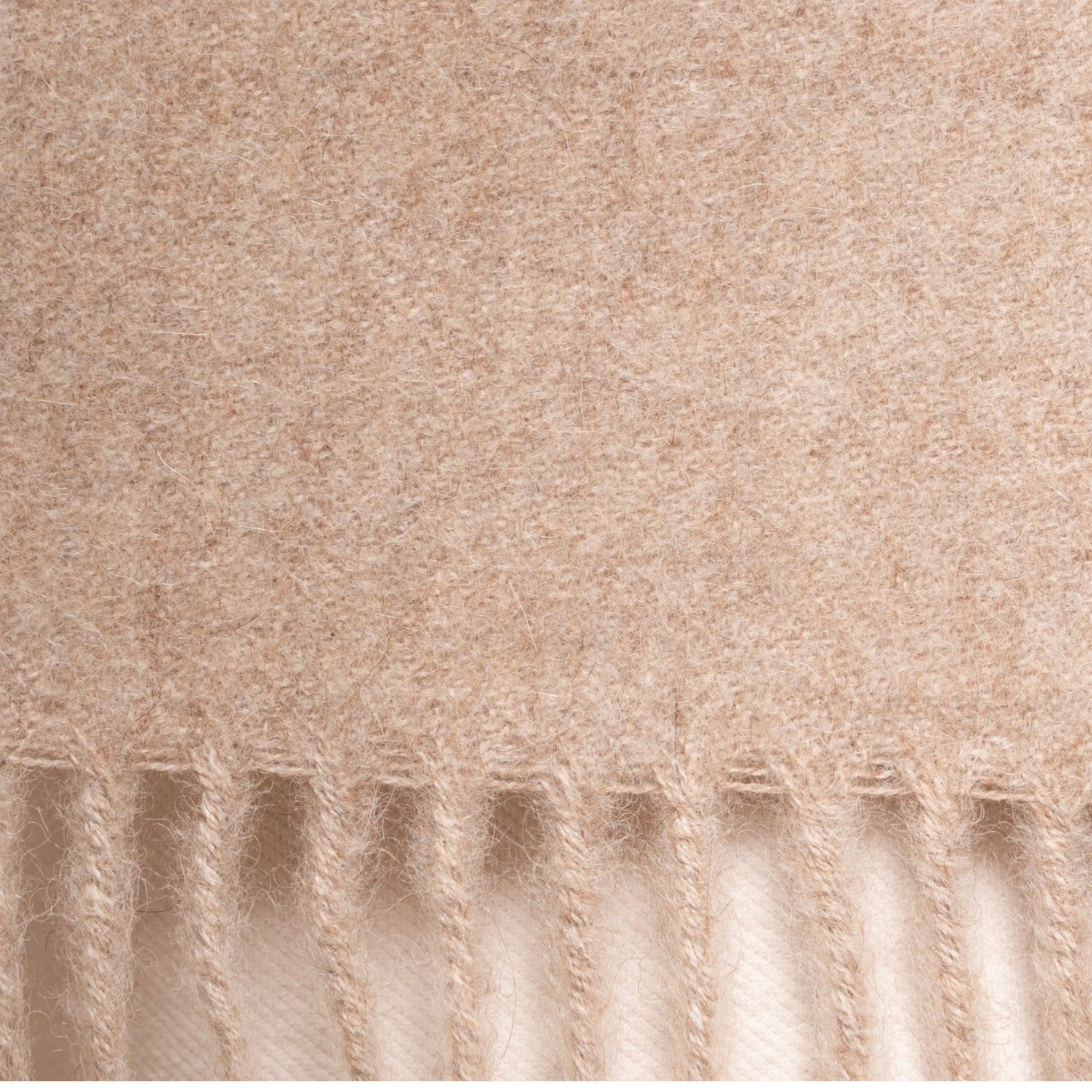 Close Up Undyed oatmeal alpaca scarf styled for effortless everyday warmth and luxury