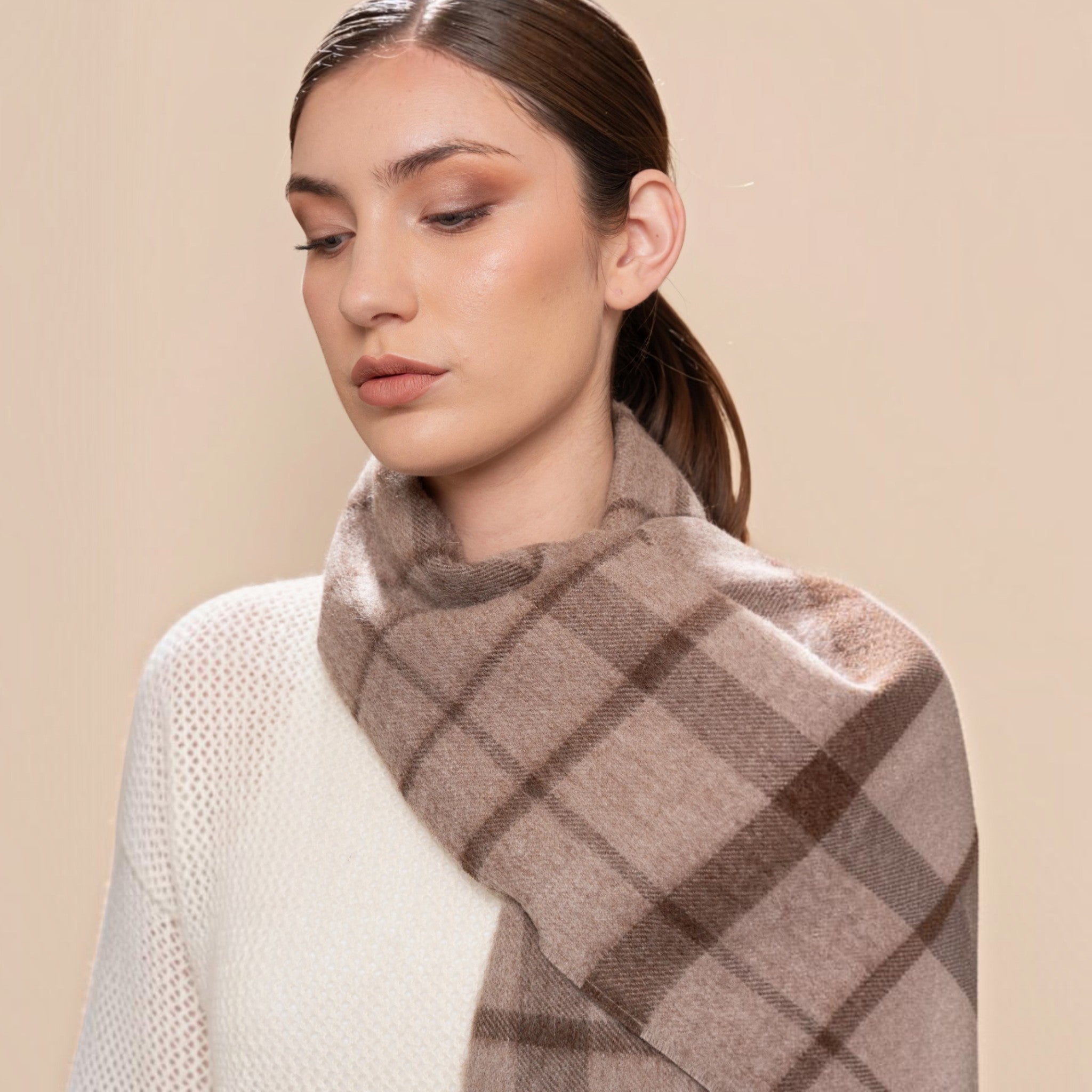 Soft taupe and brown Baby Alpaca Eco plaid scarf styled with a cream knit sweater