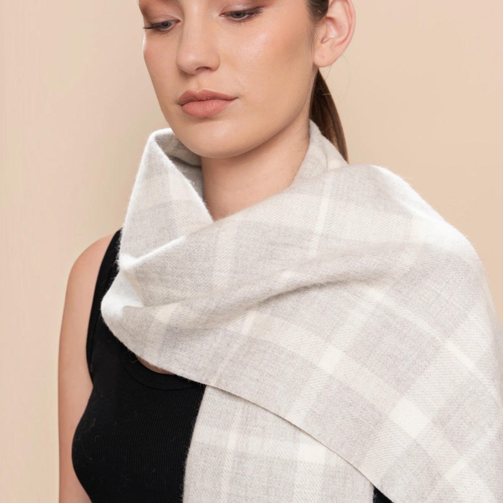 Natural white and grey Baby Alpaca scarf with brushed softness, plaid pattern and twisted fringes
