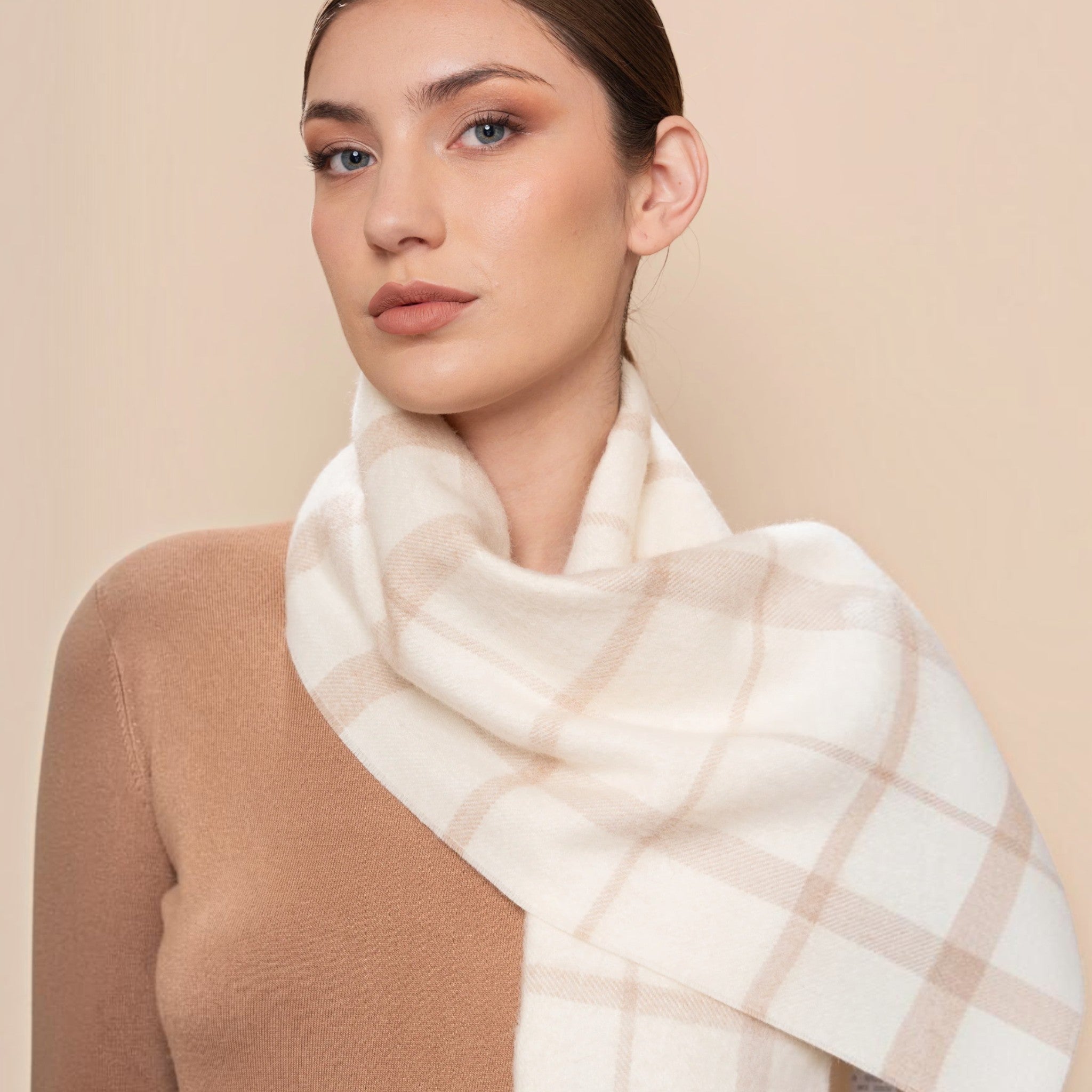Soft ecru and beige Baby Alpaca Eco plaid scarf styled long with elegant natural tones