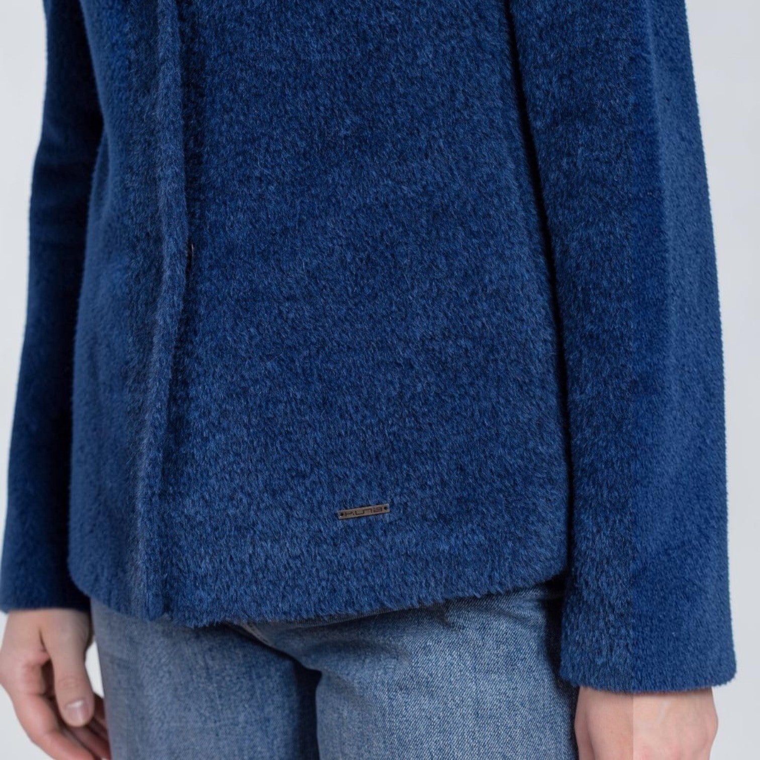 Women’s blue Suri alpaca jacket with classic winter styling
