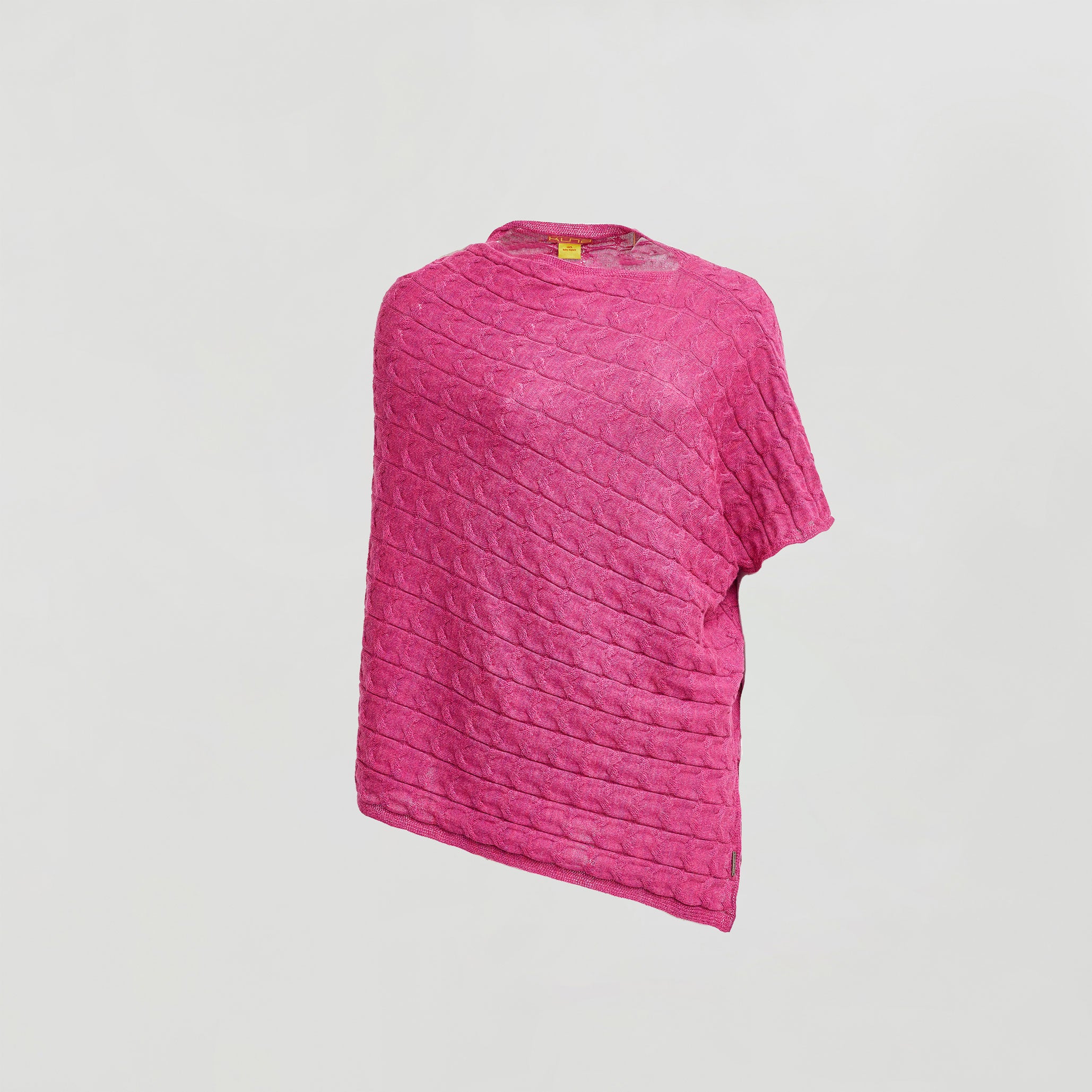 One-size pink alpaca poncho with relaxed drape and side split