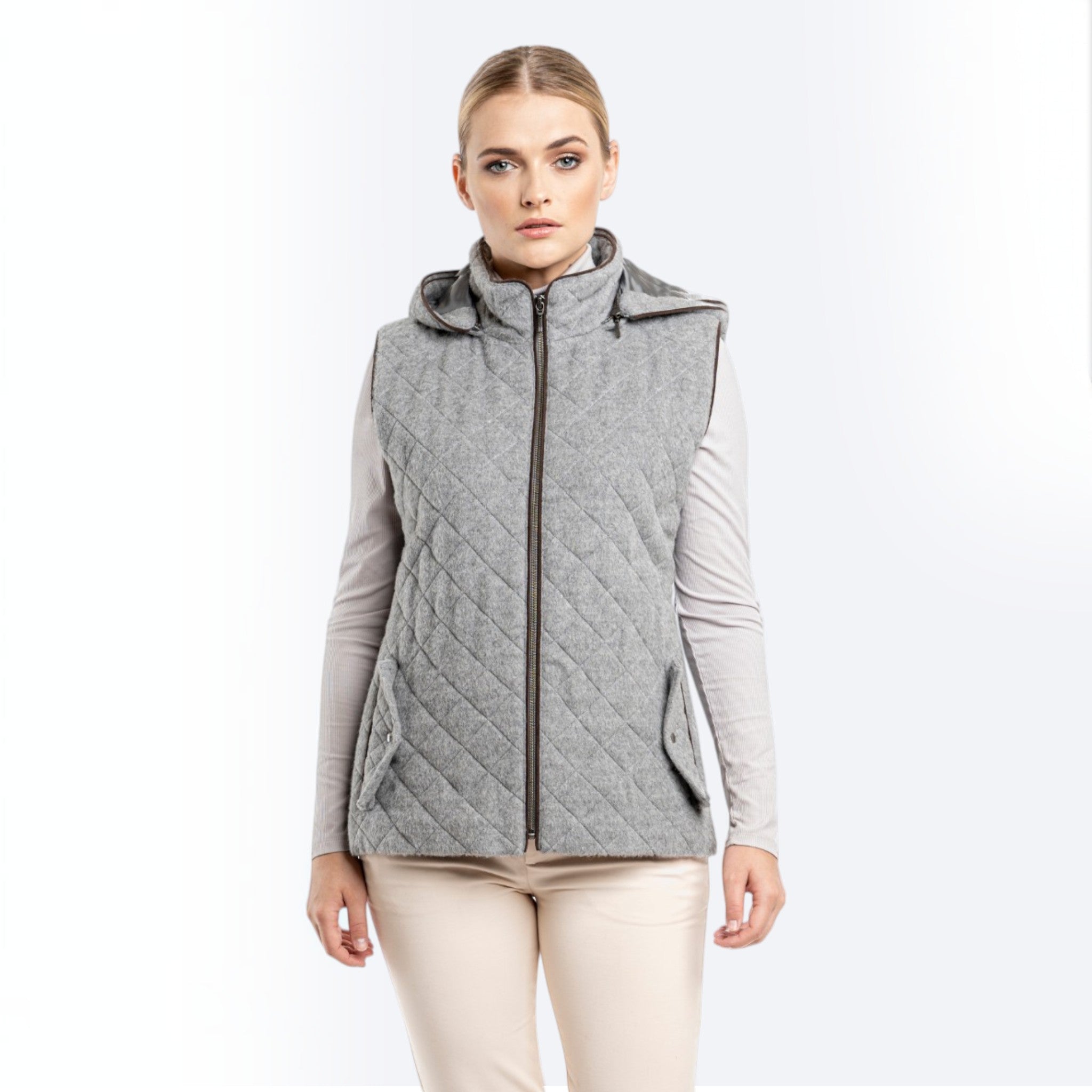 Women’s silver quilted baby alpaca vest with removable hood and full zip front