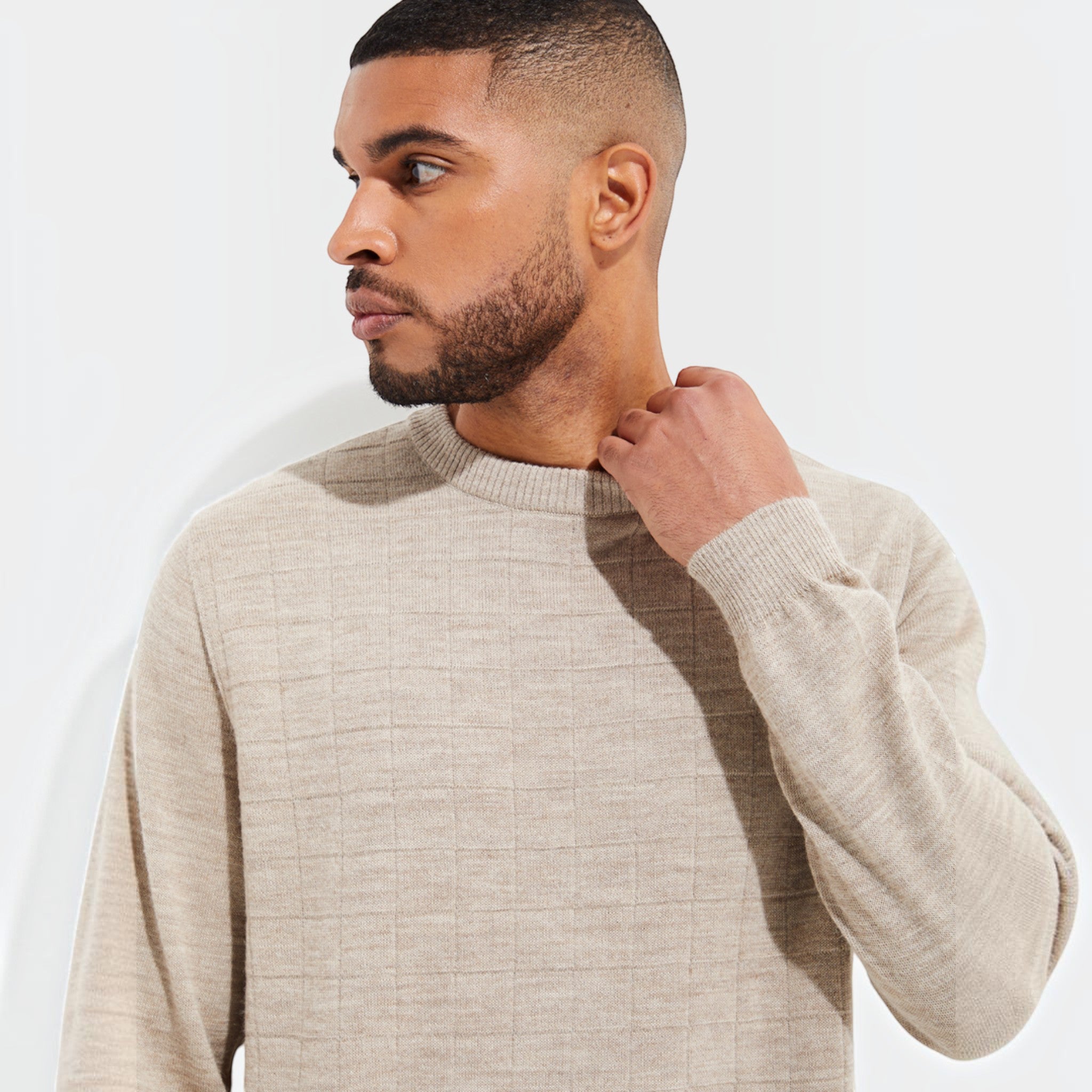 Close up of Yale crew-neck sweater in Pelicano beige, made from 100% Baby Alpaca